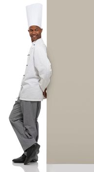 Endorsing your copyspace. A young chef leaning against your copyspace.