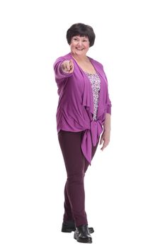 full-length.casual elderly woman in a purple blouse.