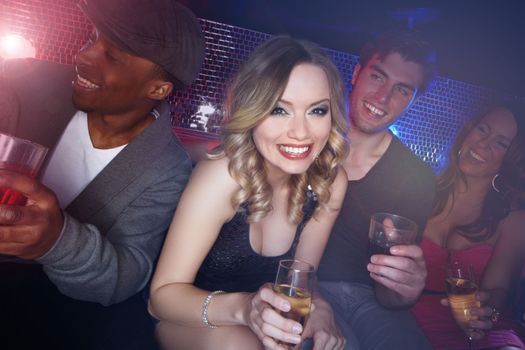 Party, happy hour and woman portrait for new year and social event at a disco nightclub. Champagne, dj set and alcohol drink of friends smile ready to celebrate the night with dance and happiness
