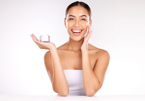 Skincare, cream and portrait of woman in studio for cosmetics glow, shine and product promotion, marketing or advertising mockup. Face of a young model with dermatology skin care for facial wellness