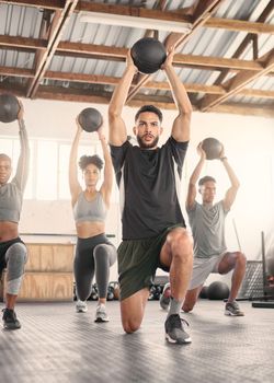 Fitness, training and medicine ball with people in gym and class for workout, health and sports exercise. Wellness, strong and weights with athlete bodybuilder for muscle, coaching and endurance