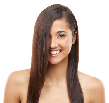 Shes confident about her haircare regime. Portrait of an attractive young woman with long and healthy hair.