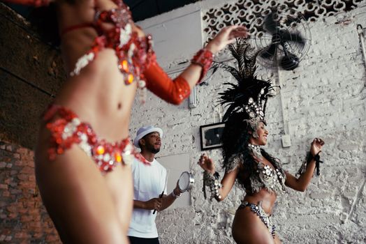 Beautiful bodies of Brazil. two beautiful samba dancers and their band.