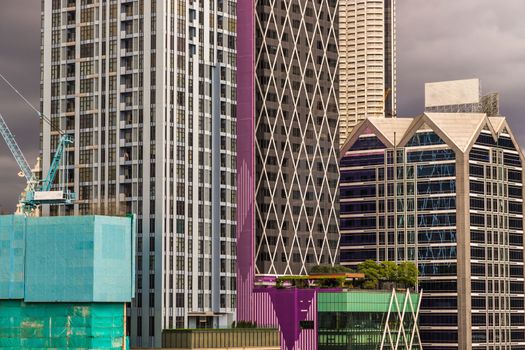 Detail of Modern Office building in downtown Bangkok. Modern architecture building background.