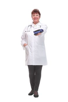 Senior female doctor holding a blood pressure cuff a hand on a white background