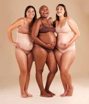 Pregnant body, portrait or laughing women on studio background in diversity empowerment, baby support and community. Smile, happy or pregnancy friends in underwear with stomach in funny or comic joke