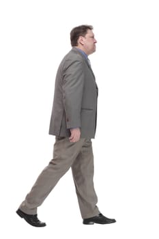 full-length. casual man in a grey jacket striding forward.
