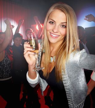Night club, party and woman with champagne to celebrate, techno smile and social at a rave event. Rock disco, happy concert and portrait of a girl at a club new year celebration with a drink