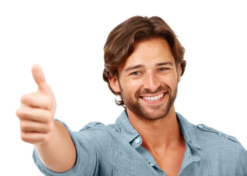 Thumbs up, OK and man with smile, face with hand sign, yes and thank you with feedback against white background. Happy man, agreement and success with motivation for winner and vote in portrait