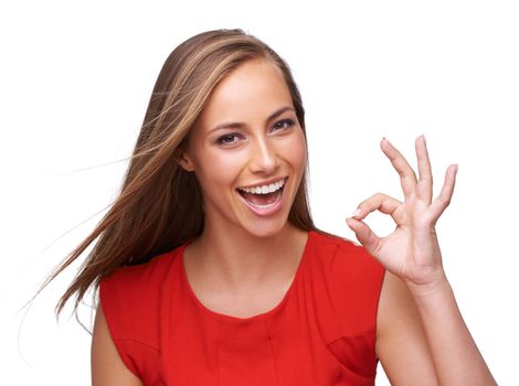Good job. Yes, ok and portrait of girl with hand emoji for happiness in approval, success and opinion. Young and beautiful model confident in agreement with happy smile at isolated white background.