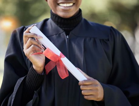 University graduation, diploma and hands of black woman with award for studying achievement. Closeup graduate student with paper certificate of success, celebration and education goals of learning
