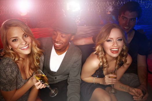 Friends, new year and party in nightclub event, social and drink with happy smile, portrait and happy hour together. Men, women and happiness with celebration at night with drinks, disco and excited