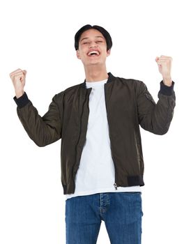 Portrait, winner and success celebration of man in studio isolated on white background. Winning, achievement and happy, young and excited male fist pump celebrating goals, targets or lottery victory