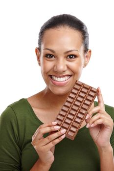You thought I was going to share. Portrait of an attractive young woman holding a slab of chocolate isolated on white.