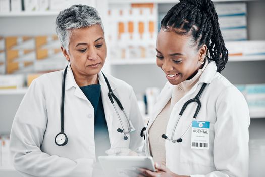 Pharmacy, tablet and pharmacist women research for healthcare, telehealth services and medicine teamwork. Technology, healthcare and doctors on internet or e commerce for medical pharmaceutical drugs.