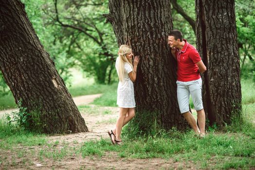 couple in love at a picnic in a park with green grass