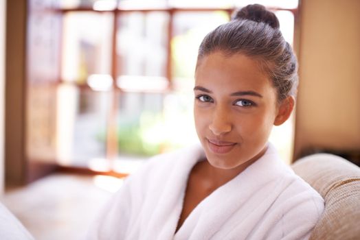 Happiness comes from a day at the spa. a young woman in a bathrobe at a health spa.