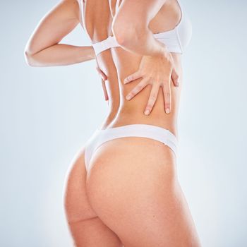 Skincare, beauty and butt of woman in underwear on studio background for body wellness and smooth behind. Health, lingerie and sexy woman buttocks for luxury spa cellulite or liposuction treatment.