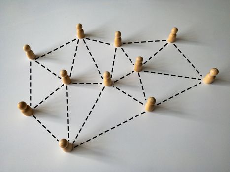 Wooden people figure networking concept. Online internet communication and networking concept.