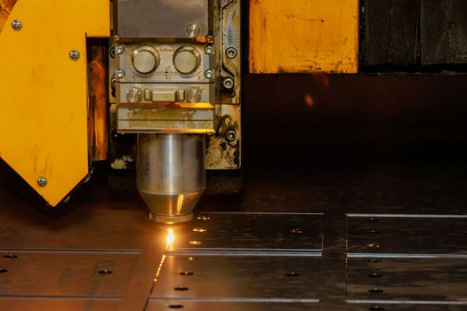 CNC laser cutting metal sheet. High precision CNC gas cutting metal sheet in metal industry factory.