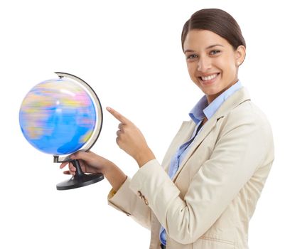 Our business will spin your world around. an attractive young businesswoman pointing to a globe.
