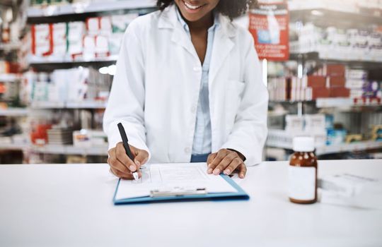 I have something for you that ticks all the boxes. an unrecognizable young female pharmacist working in a pharmacy.