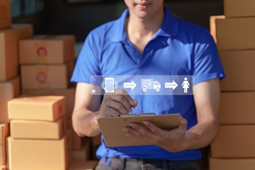 Asian courier with parcel and delivery logistic concept. Delivery man with checking list on clipboard