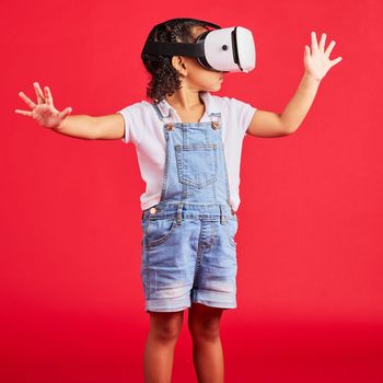 Gaming, virtual reality and metaverse with girl and glasses for digital transformation, wow and innovation. Happy, cyber and augmented reality with child and vr headset for technology, future or 3d