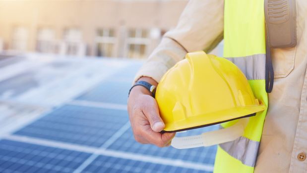 Engineering, solar energy or hand with helmet for safety while working on photovoltaic development project. Industry hat, solar panels or construction worker working on building rooftop maintenance
