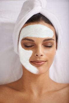 Deep cleansing skincare. A young woman getting a facial at a spa.