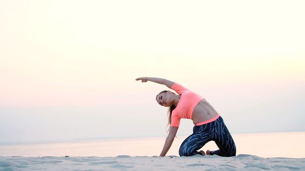 healthy yoga woman meditation at sunrise seaside. High quality photo