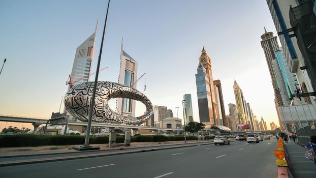 Traffic on the main street of Dubai in the evening.