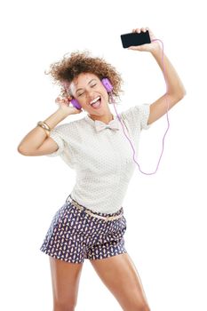 Phone music, dance singer and black woman listening to song, audio podcast or radio sound for energy, relief or fun. Studio singing, dancer girl or retro dancing student isolated on white background