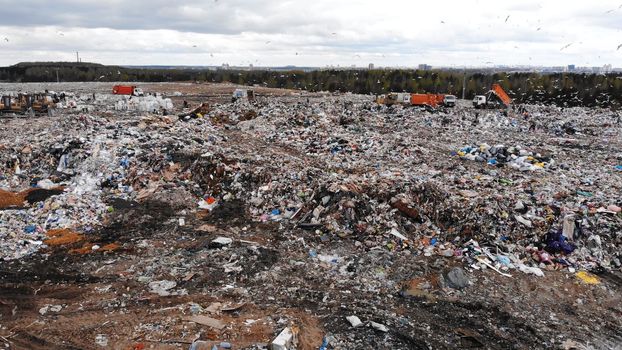 Large landfill near the metropolis in autumn.
