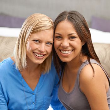 Girls weekend away. Cropped portrait of two attractive young women smiling happily.