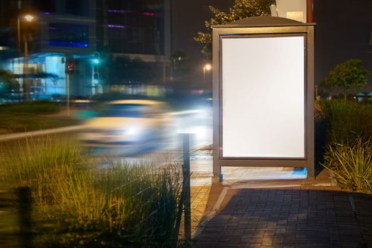 Outdoor advertising on the whole is constantly evolving. a blank light box on a bus stop.