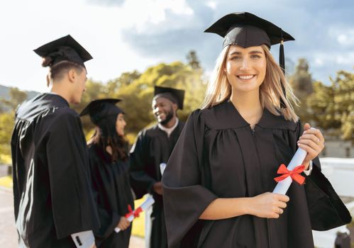 Woman, student and portrait smile for graduation, ceremony or achievement in higher education. Happy female academic learner holding certificate, qualification or degree for university scholarship
