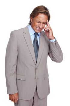 Stress, anxiety and headache of sad ceo upset thinking of career problem, mistake or fail. Depressed, frustrated and tired corporate businessman overwhelmed at isolated white background.