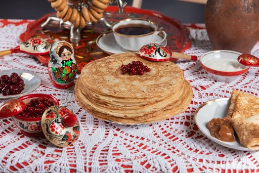 Russian pancake blini with berries and sour cream