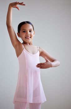 Her passion will keep growing. Portrait of a little girl practicing ballet in a dance studio.