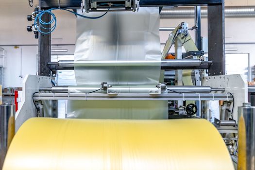 plastic roll on a machine for the production of plastic bags
