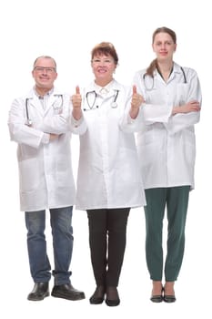 Team of doctors standing arms crossed and smiling at camera