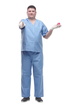 male doctor with a laboratory flask in his hands .