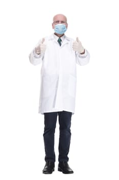 male doctor in protective mask showing thumbs up .