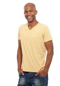 Positively confident. Portrait of a smiling young ethnic man standing casually against a white background.