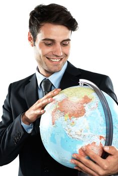 Globe, earth and man employee with planet sphere feeling happy about global travel. International, person and happiness of a excited worker with isolated white background in a suit with a smile