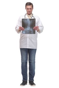 Front view of hospital doctor holding patient's x-ray film