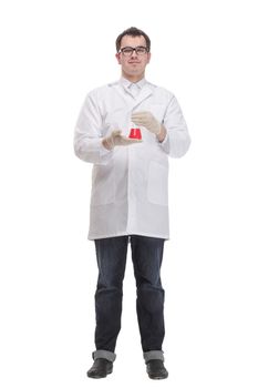 Front view portrait of confident male doctor standing with arms crossed