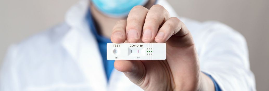 Negative test result by using rapid test device for COVID-19.