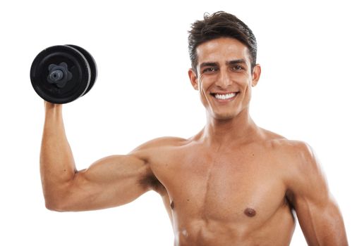 Strong and healthy. Portrait of a handsome shirtless young man lifting weights against a white background.